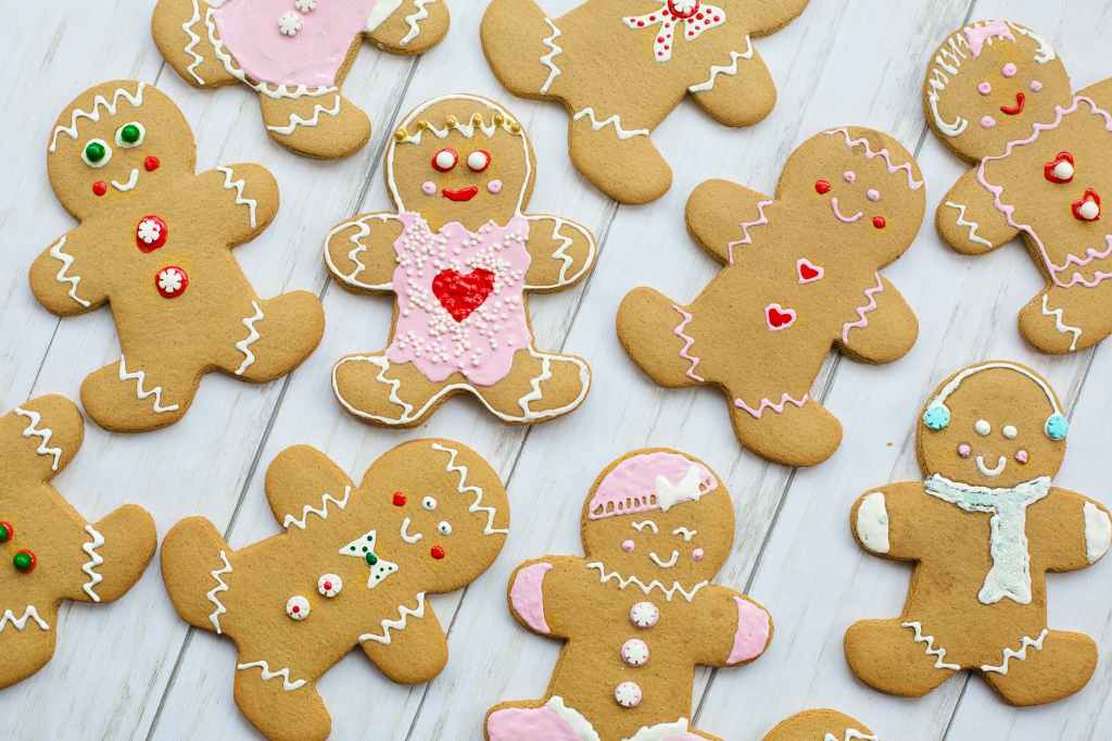 Christmas gingerbread men and women with pink icing