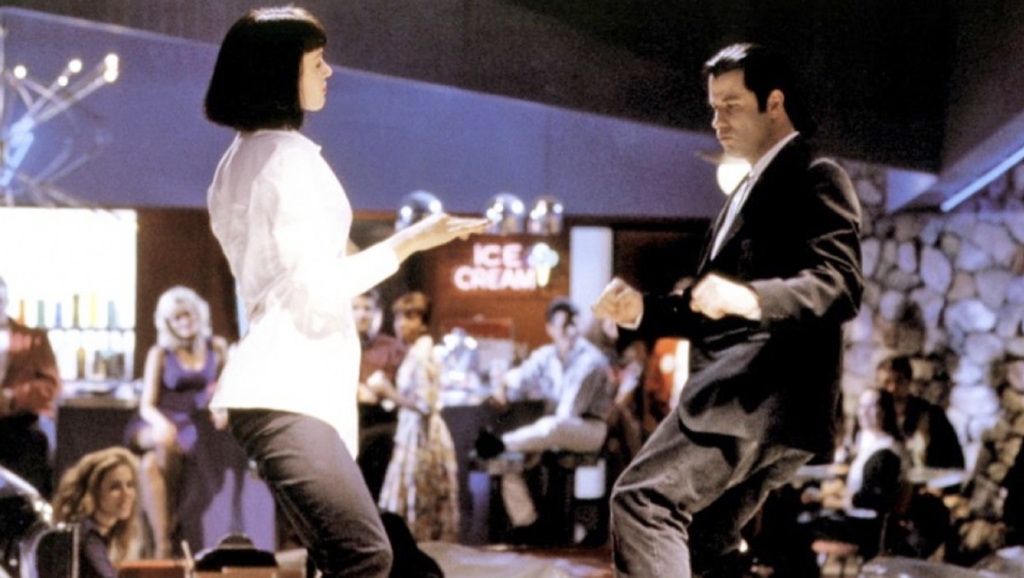 The two characters from 'Pulp Fiction' dance in a bar while people watch.