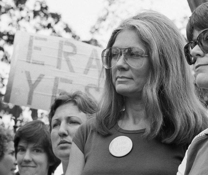 Activist Gloria Steinem is at a pro-ERA rally with other women