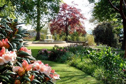 The Botanical Gardens in Sheffield, featuring pink flowers and a fountain.