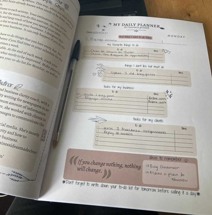 An A4 planner is open at a page for "Monday" with a few notes of what the user wants to do