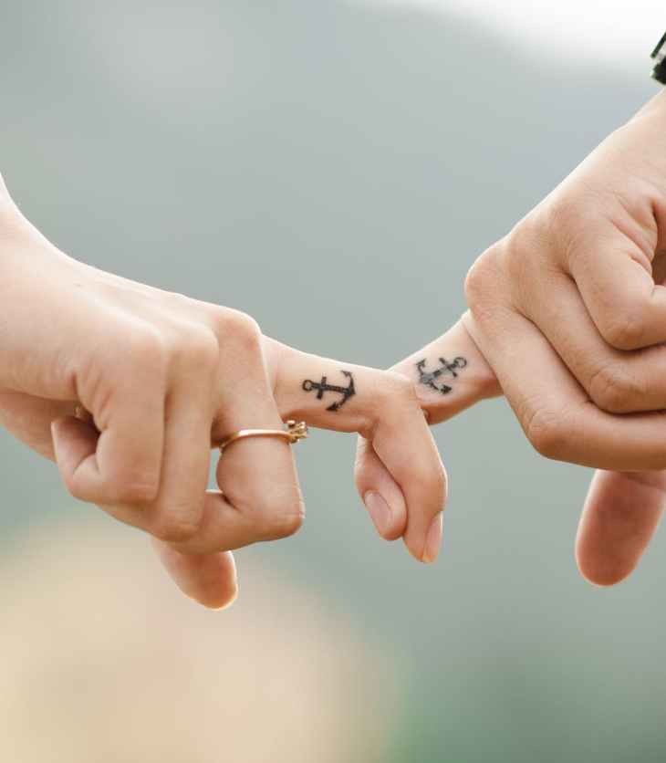 a couple holding hands- 8 Date Ideas for Long Distance Couples