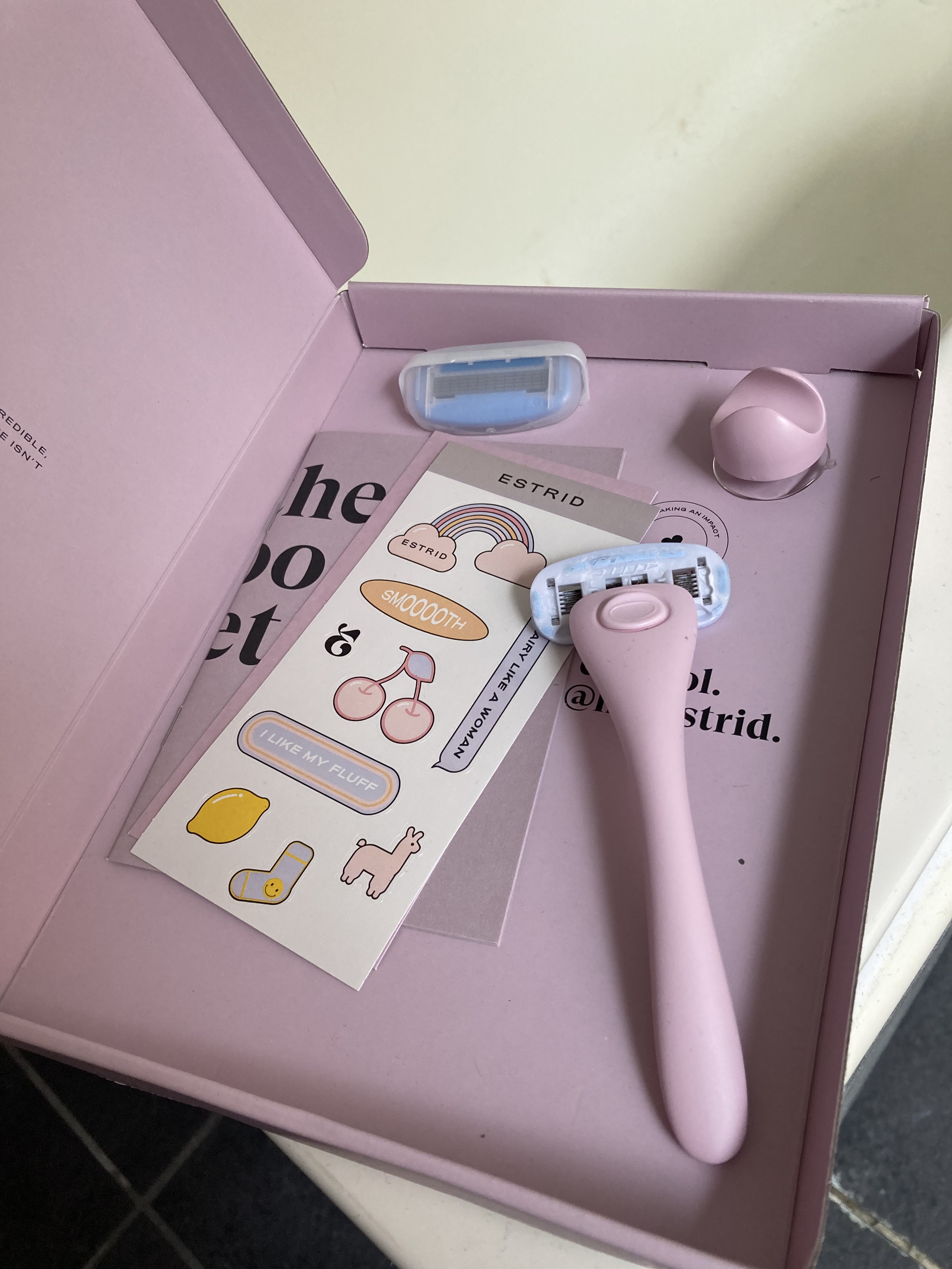 An Estrid start kit, including a reusable razor, new razor head, cartoon stickers and a shower holder. Getting ready for Summer with Estrid razors