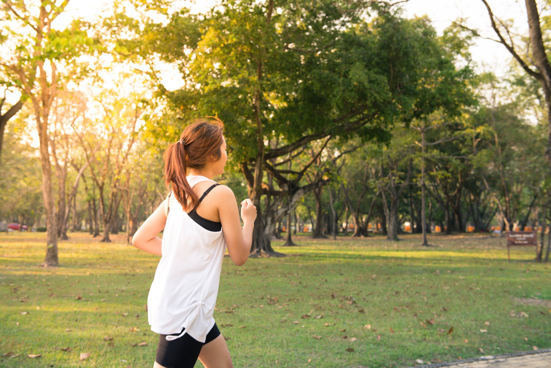woman about to run during golden hour- 5 ways to switch off after a day at work