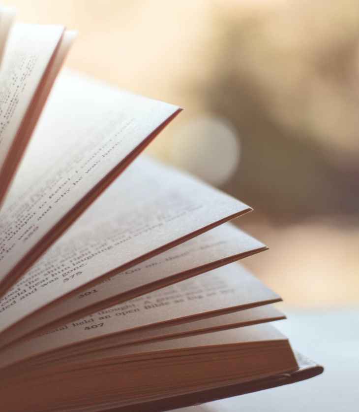 book opened on white surface selective focus photography, 5 books I've read in 2022 so far