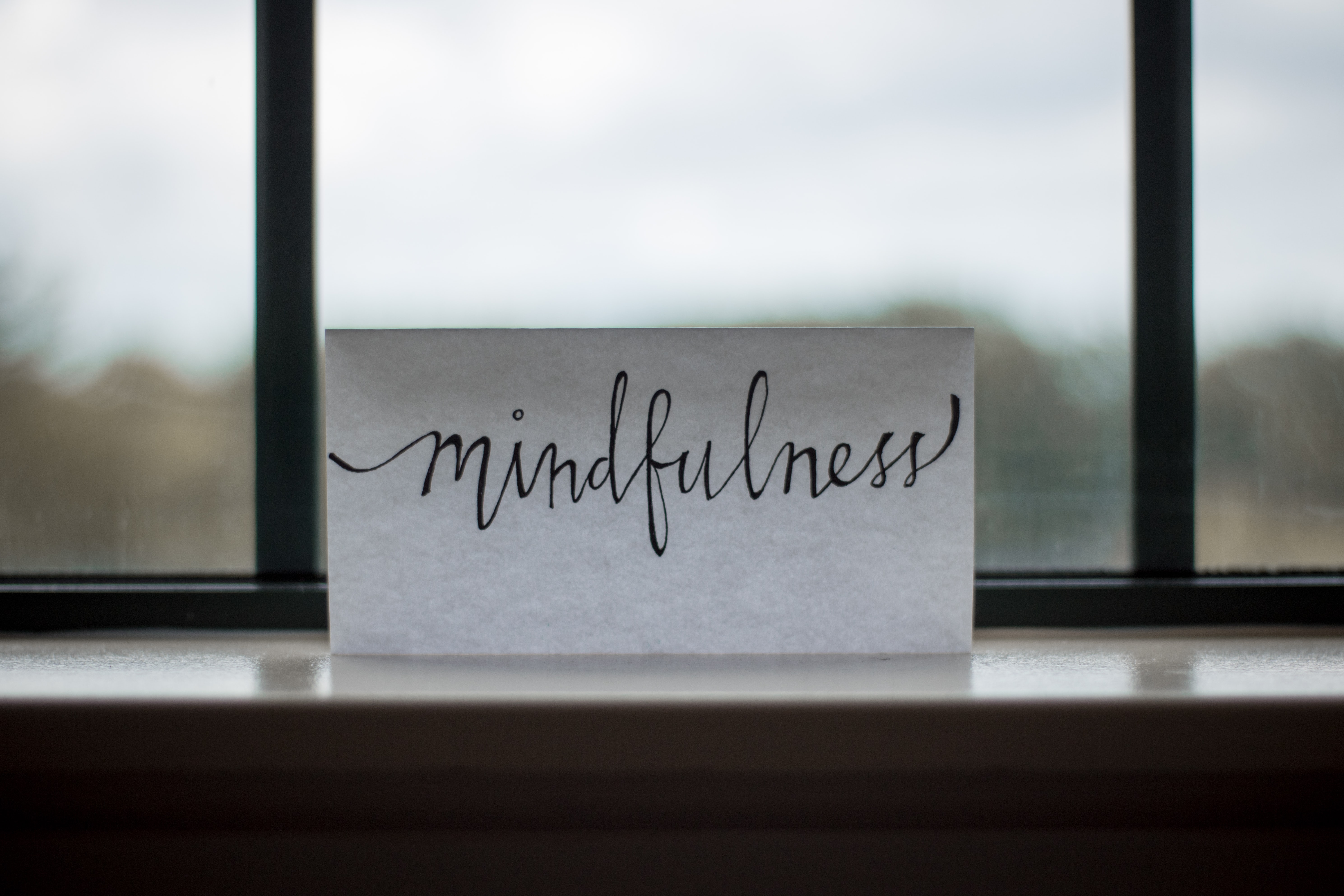 mindfulness sign on a window