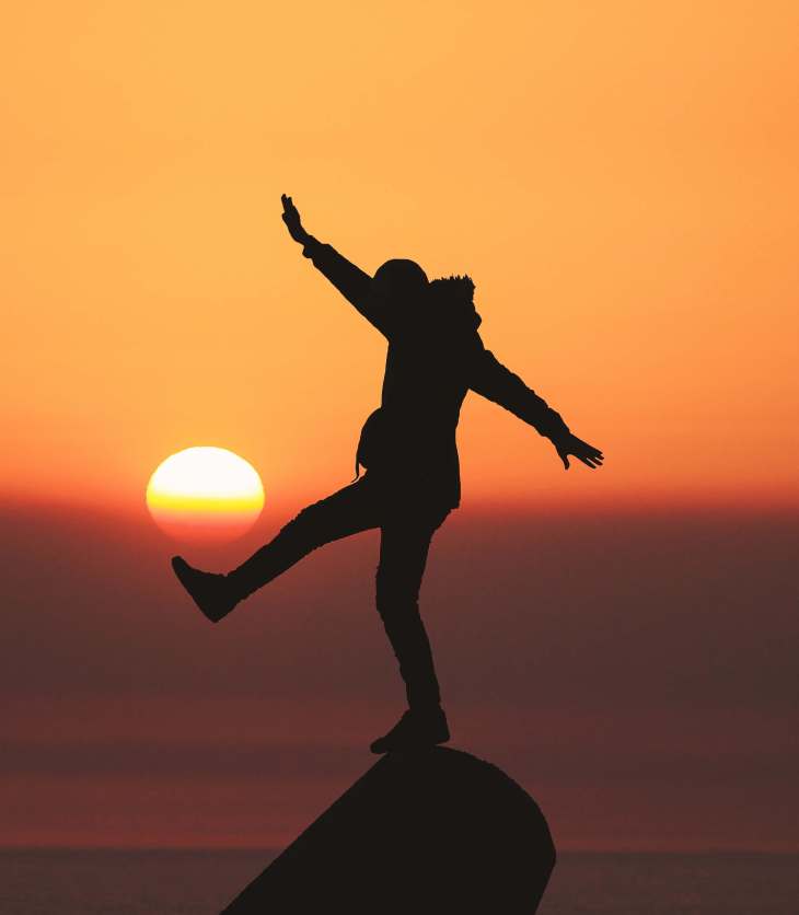 silhouette in front of sunset