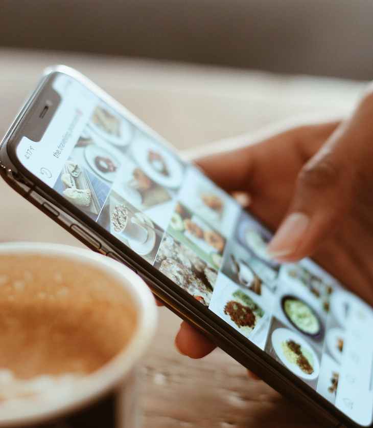 selective focus photography of person using iphone x