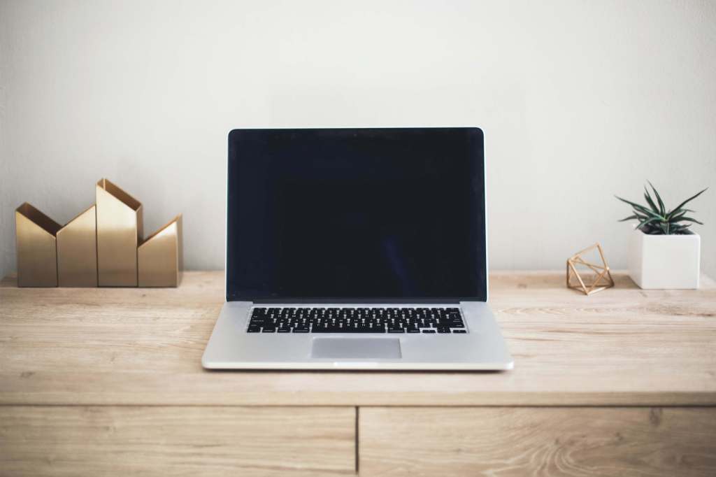 laptop on a desk: step-by-step guide to build the right freelance routine for you