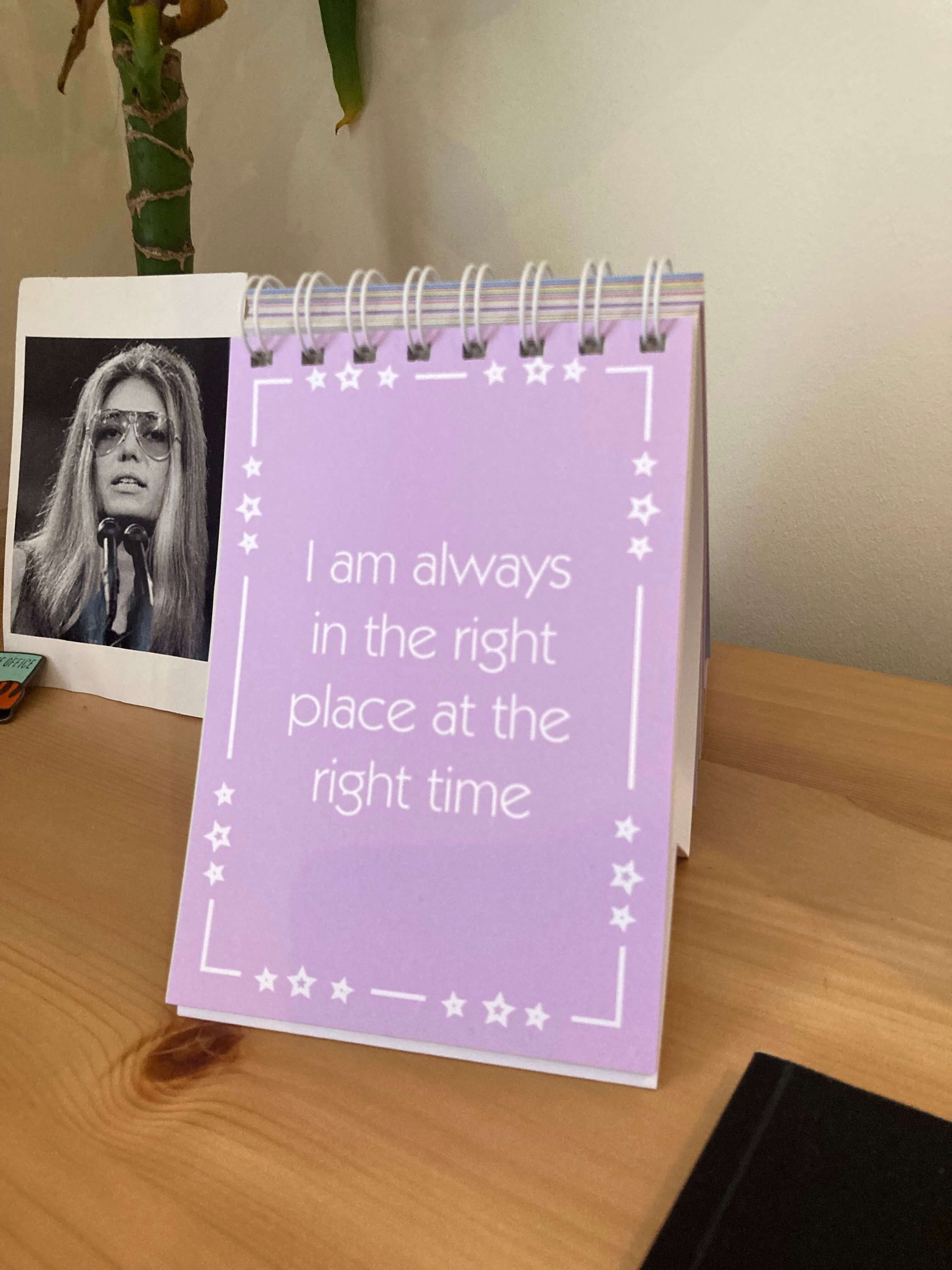 a sign that says "I am always in the right place at the right time"