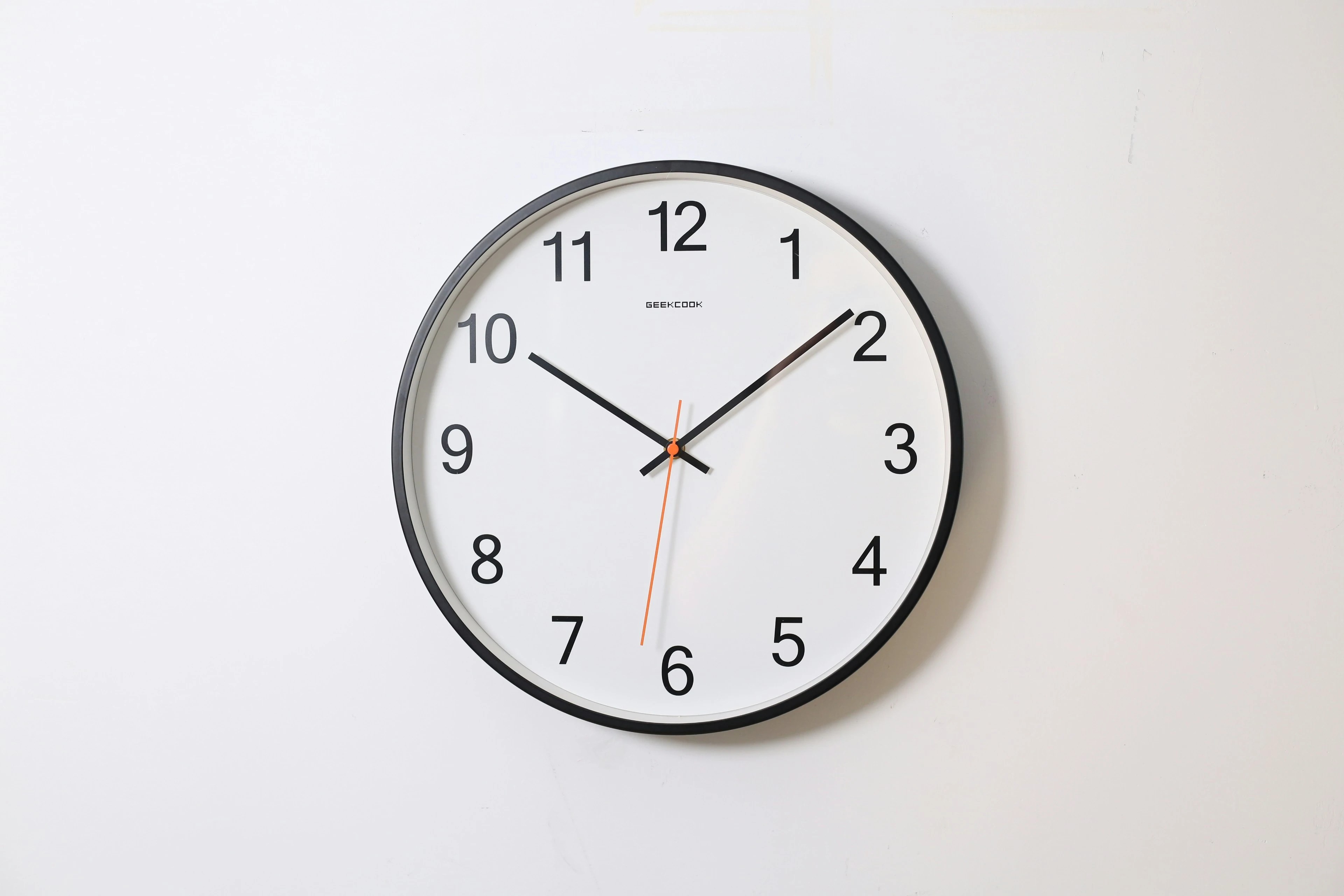 clock on a wall: tips to manage your time as a remote worker