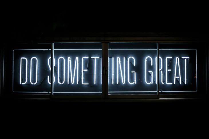neon lights that say "do something great"