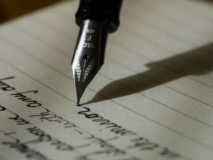 fountain pen writing a letter
