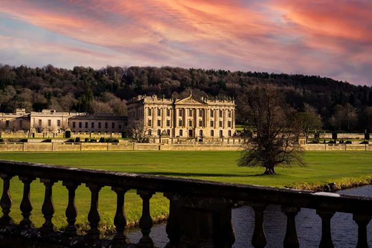 chatsworth stately home with a red sky