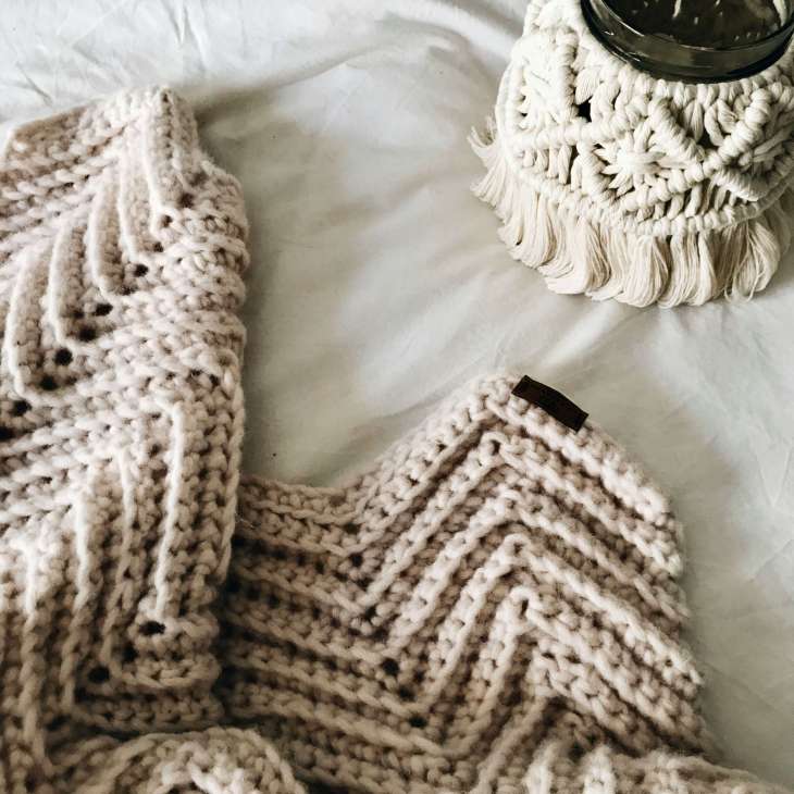 cable knit jumper with a tea cosy