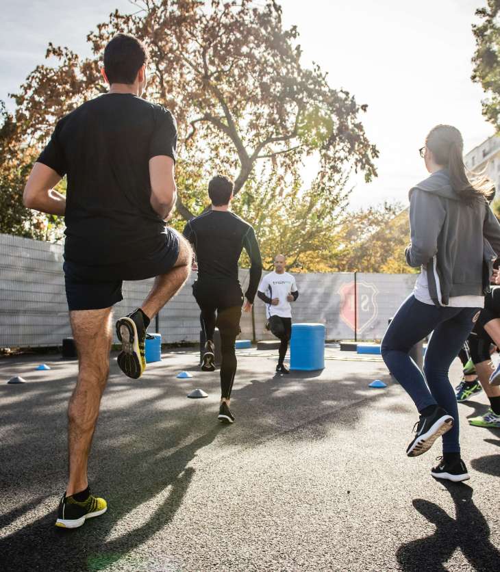 a group running on the spot